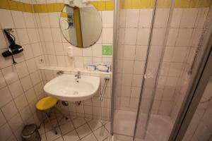 Koupelna v ubytování Hotel Relax