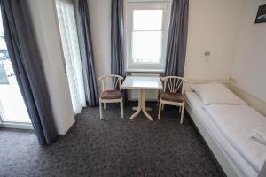 Postel nebo postele na pokoji v ubytování Hotel Relax