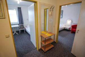 Postel nebo postele na pokoji v ubytování Hotel Relax