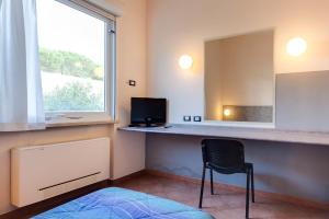 TV o dispositivi per l'intrattenimento presso AutoHotel