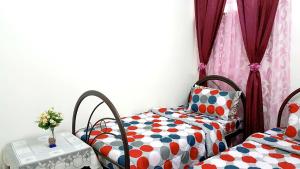 Postel nebo postele na pokoji v ubytování Mahkota Cheras Sweet Condo 1-14 pax near MRT to KL