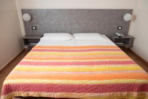 Letto o letti in una camera di AutoHotel
