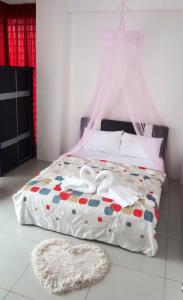 Postel nebo postele na pokoji v ubytování Mahkota Cheras Sweet Condo 1-14 pax near MRT to KL