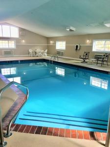 a large swimming pool with blue water at Quality Inn Lawton near Fort Sill in Lawton