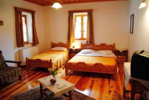 Postel nebo postele na pokoji v ubytování Hotel Kaiti + 13 fotografií