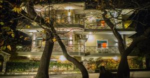 A garden outside Asteras Hotel