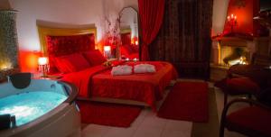 A bed or beds in a room at Asteras Hotel