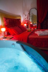 A bed or beds in a room at Asteras Hotel