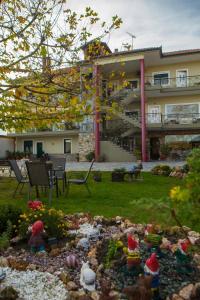 A garden outside Asteras Hotel