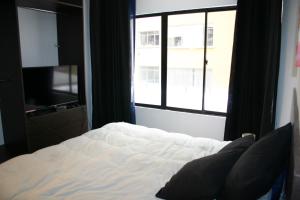 Apartment Cipres tesisinde bir odada yatak veya yataklar
