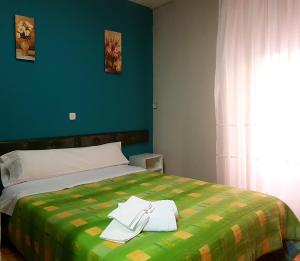 Posteľ alebo postele v izbe v ubytovaní Hostal Padre Isla 1