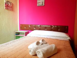 Posteľ alebo postele v izbe v ubytovaní Hostal Padre Isla 1