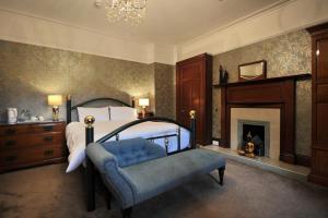 A bed or beds in a room at St Michaels Guest House