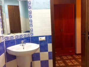 a bathroom with a sink and a mirror at Hostal Ribera de Salobre in Salobre +21 photos