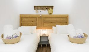 Łóżko lub łóżka w pokoju w obiekcie Madrid Center, Apartamento de 2 dormitorios