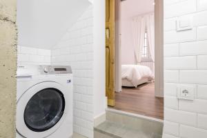 Łóżko lub łóżka w pokoju w obiekcie Madrid Center, Apartamento de 2 dormitorios