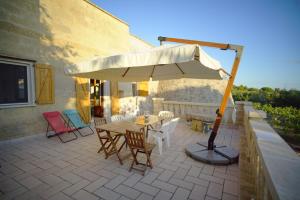 Patio nebo venkovní prostory v ubytování Villa Le Macchie