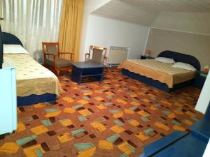 Postel nebo postele na pokoji v ubytování Dalin Vila