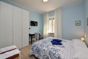 A bed or beds in a room at Casa Malìca