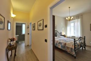 A bed or beds in a room at Casa Malìca