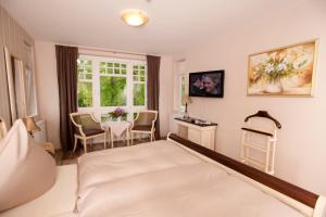 Katil atau katil-katil dalam bilik di Hotel Bess