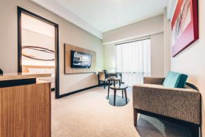 TV a/nebo společenská místnost v ubytování Enso Hotel