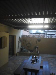 a room with a wooden table in a building at Silvermoon in Nigel