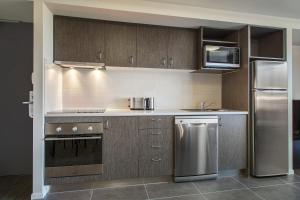 A cozinha ou cozinha compacta de Quest Rockhampton