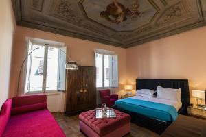Postel nebo postele na pokoji v ubytování Hotel la Scala