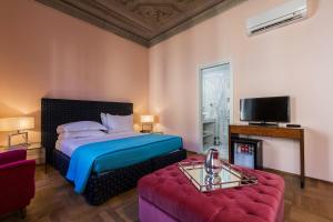 Postel nebo postele na pokoji v ubytování Hotel la Scala