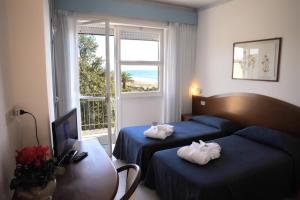 Postel nebo postele na pokoji v ubytování Villa Dei Principi Hotel