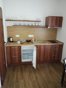 Küche/Küchenzeile in der Unterkunft Apartmán B 101 Vysoké Tatry