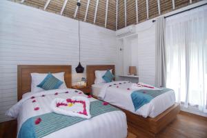 Voodi või voodid majutusasutuse Sadev Resort toas