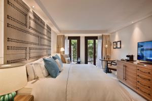 Postel nebo postele na pokoji v ubytování Orient by Isrotel Exclusive