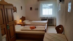 Postel nebo postele na pokoji v ubytování Gasthaus Mösle
