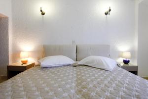 Кровать или кровати в номере Mare Vista Hotel - Epaminondas