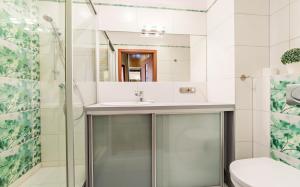 Łazienka w obiekcie Apartamenty Sun & Snow Osiedle Podgórze