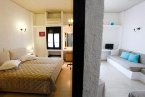 Кровать или кровати в номере Mare Vista Hotel - Epaminondas