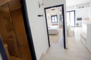 Кровать или кровати в номере Mare Vista Hotel - Epaminondas