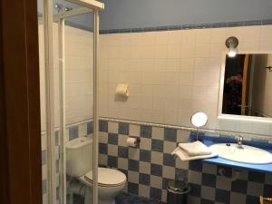 Kylpyhuone majoituspaikassa Apartamento La Plazuela