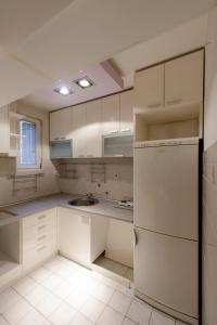 Una cocina o kitchenette en Garni Hotel Crystal