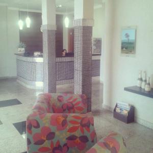 Onix Inn Hotel的休息区