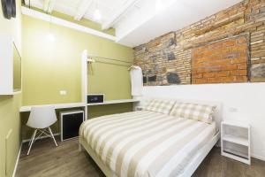 Ein Bett oder Betten in einem Zimmer der Unterkunft Rumi Rooms