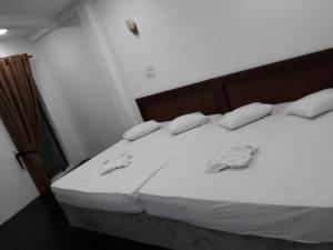 Postel nebo postele na pokoji v ubytování The Kingston Hotel