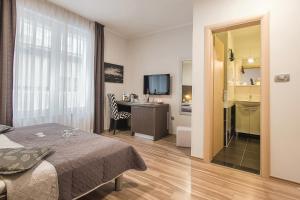 Postel nebo postele na pokoji v ubytování Holiday Center Ivona