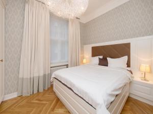 Postel nebo postele na pokoji v ubytování Harju Old Town Apartment