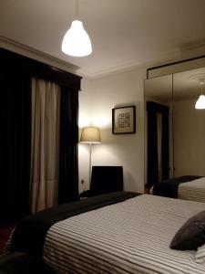 Cama o camas de una habitación en Casa de Santo Amaro