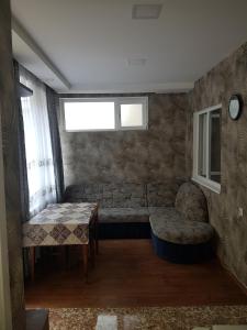 Posezení v ubytování Guest House Nua