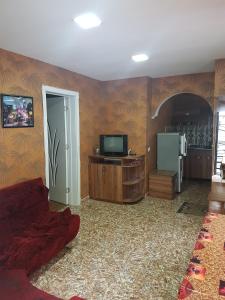 TV a/nebo společenská místnost v ubytování Guest House Nua + 36 fotografií