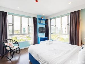 Postel nebo postele na pokoji v ubytování Baan Imm Aim Huahin sea view